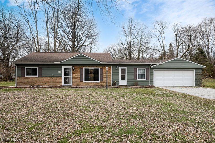 This charming home is waiting for its new owners to make memories. The open-concept layout of the kitchen and dining area is perfect for entertaining or spending time with family and friends. The beautiful cabinets and tile backsplash add a touch of elegance to the space. The living room is cozy and inviting, with plenty of room to lounge and relax. The three bedrooms provide plenty of space for rest and relaxation. Step outside to the back deck for some peace and quiet or use the cement slab with electric for outdoor fun. With a large lot, and 2 car garage, there is plenty of space for outdoor activities. Don't miss out on the opportunity to make this house your dream home!