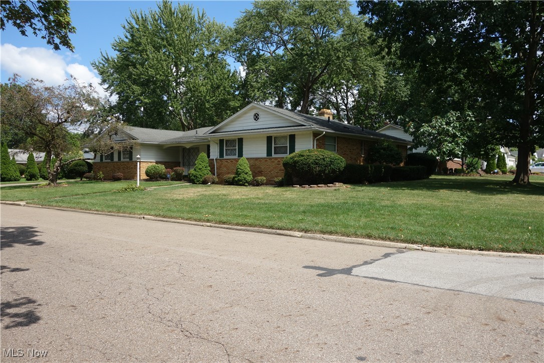 Rare find!! Spacious rambling brick ranch waiting for you to add your touch. Located on a well maintained corner lot which is almost a half acre. This home has 3 bedrooms and four baths with room for everyone to have their own space which includes a family room, sun room and a recreation room. There are beautiful hardwood floors throughout. The kitchen has an abundance of storage and eating area. Enjoy a formal dining room with a beautiful crystal chanderllier which flows into the formal living room. The family room is perfect for relaxing or enjoy the sun room. Enjoy all the amenities of gracious living the moment you enter the foyer which leads to the many living areas . Electrical and plumbing repairs and upgrades have been made plus the home has a Home Warranty. The garage has additional storage and generous parking in the driveway.