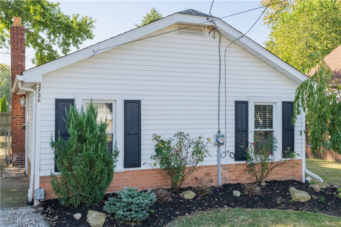 A completely updated 2 Bedroom 1 Bath Home in the heart of Mogadore. Open beamed ceiling in the living room with vinyl plank flooring. Two Bedrooms with vinyl plank flooring. Entire home was freshly painted with neutral colors. Open kitchen with a breakfast bar and newer appliances. Full unfinished basement with updated Electric panel and new Hot Water tank. Fenced level backyard. Convenient location in Mogadore.