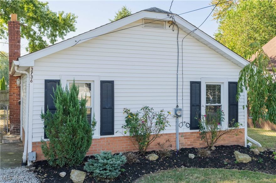 A completely updated 2 Bedroom 1 Bath Home in the heart of Mogadore. Open beamed ceiling in the living room with vinyl plank flooring. Two Bedrooms with vinyl plank flooring. Entire home was freshly painted with neutral colors. Open kitchen with a breakfast bar and newer appliances. Full unfinished basement with updated Electric panel and new Hot Water tank. Fenced level backyard. Convenient location in Mogadore.