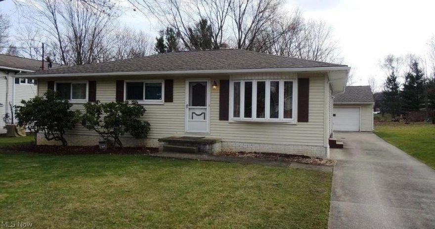 Hard to find ranch in the desirable Birchwood Hills development of Twinsburg. This sparkling clean home is completely move-in ready, and boasts substantial updates, an enormous 1/2 acre lot, and an oversized 2 car garage and central air! You will love the floor plan, spacious and open - the first floor features a huge master bedroom with dual closets + a half bath, two additional bedrooms and a very nice full bath!  All bedrooms have hardwood flooring in excellent condition.  Living room has brand new carpeting, a bay window, and opens to the dinette/kitchen.  Kitchen comes fully equipped with all white appliances - refrigerator, dishwasher, and oven/range, and walks out to the back patio.  The basement is gigantic - there is a 41 x 18 rec room with wet bar, another full bathroom, bright and clean laundry room (washer/dryer included!) as well as extra storage space.  Updates include - roof 2012, siding 2012, ceramic kitchen/dinette flooring 2016, kitchen backsplash 2016, carpeting (mai