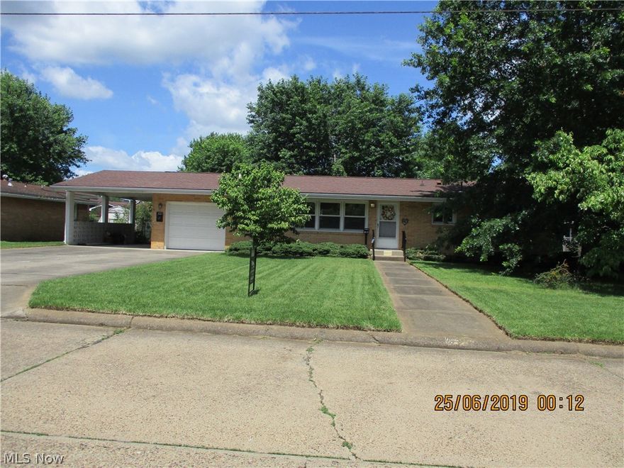 One floor living!  Well maintained starter/retirement home.  All brick, level fenced yard.  3 BR, 2 Baths, 1st floor laundry and large eat-in kitchen including all appliances.  Oversized garage and covered carport.  Large covered patio, ideal for entertaining.  Each bedroom offers a walk-in closet.  Convenient location.  Move-In Ready!