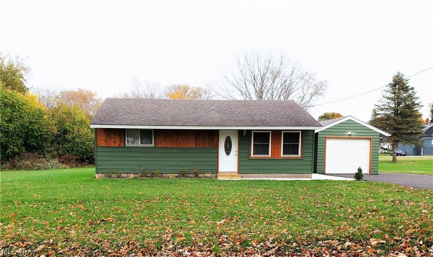 This newly remodeled home is the perfect size for a starter or retirement family.  The updated open kitchen has lots of counter space, all appliances, and a new dishwasher.  The completely new bathroom looks amazing.  New carpet, vinyl and ceramic flooring throughout.  This home will be maintenance free for many years with a new furnace, new hot water heater, and a new air conditioner.  A fresh rear concrete patio is perfect for outdoor entertaining.  The sizable yard on this quiet street is a true hidden gem.  Completing this great buy is an attached garage and a fresh new paved wide driveway.  Request a private showing today.