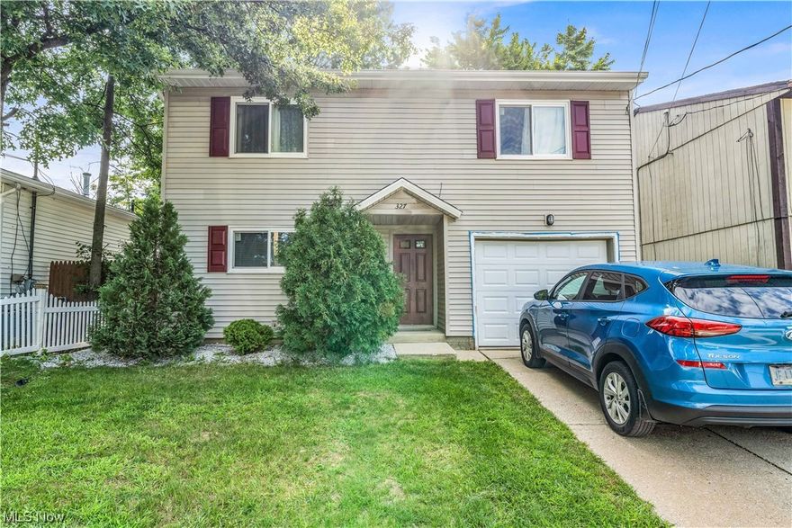 This single-family home has so much to offer and lots of big ticket updates including brand new roof installed this month!! You are welcomed into the home through an open kitchen featuring a beautiful, tiled backsplash, tons of counter space and wrap around cabinets! The kitchen opens up to the living room that features vaulted ceilings and sliding doors giving you tons of natural light leading out to the large backyard! The first floor is complete with a convenient half bath and laundry room! Upstairs you will find 3 incredibly spacious, carpeted bedrooms with windows that allow for tons of natural light! The full bathroom is also located upstairs with a tub and shower combination! Outside you will find an attached one car garage! Walk around to the deep backyard that feature a large patio that is perfect for entertaining! With easy highway access, this home is close to parks, food and public transit! Updates to this home including new carpeting in living room, stairs & master bedroom