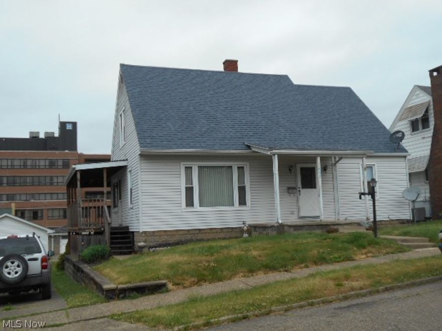 This 4 bedroom home features newer 200 amp electric, roof 2013, ,newer hi-eff furnace, vinyl replacement windows, and a full unfinished basement that has been b-dryed. The seller is offering a home warranty  along with stove, refrigerator and dishwasher.  There is a covered l-shaped deck ,one car garage and off street parking. The home is conveniently located close to the hospital and is in the Coshocton school district.