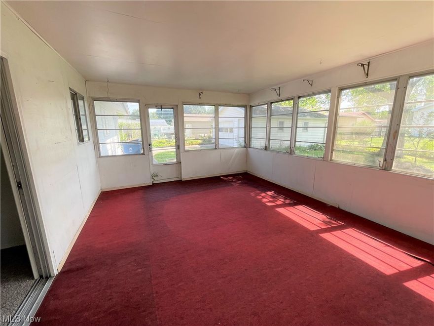 This Homewood Ranch is already for you to move right into.  It has new flooring and is all freshly painted.  Features 3 bedrooms and one and a half baths.  Off the back of the house you'll find a 14 x 17 sunroom.  Also has a 2 car detached garage and a very nice sized lot.  Don't miss out!  This one is priced to sell!  Look at it today!