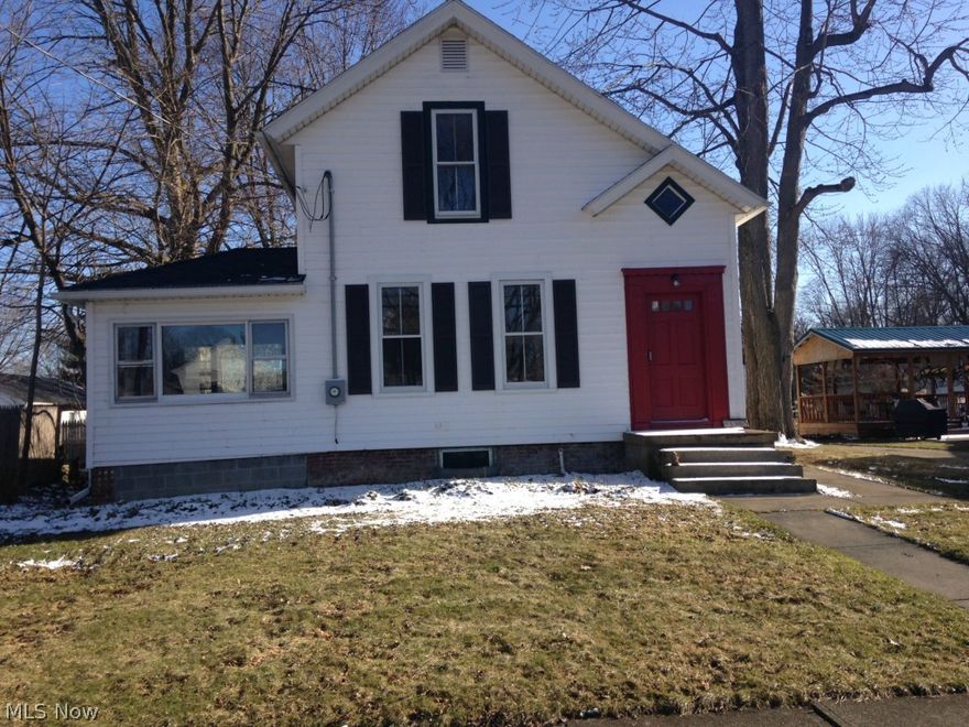 Updates include paint, flooring, kitchen and bathroom. Also a first floor laundry was added. Move-in ready.