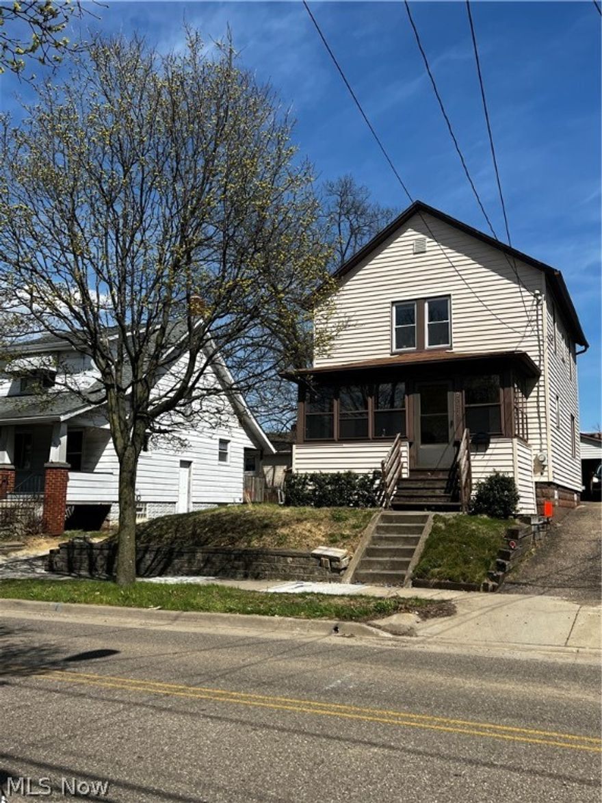 Welcome to this well maintained colonial style 2 story home. Within walking distance to Kenmore Garfield high school. You wont want to miss the open concept living and dining room with a quant window seat. The dining rooms includes double doors that open onto the spacious patio to the backyard. The extra wide 2 car garage allows room for 2 cars and extra storage. 2 great sized bedrooms upstairs with the master bedroom including a big walk in closet as well as a second closet for extra space. Make sure not to miss the extra built in storage in the hallway next to the full bathroom. Also extra storage in the basement with a washer and dryer. This home includes a home warranty! You will not want to miss this one!