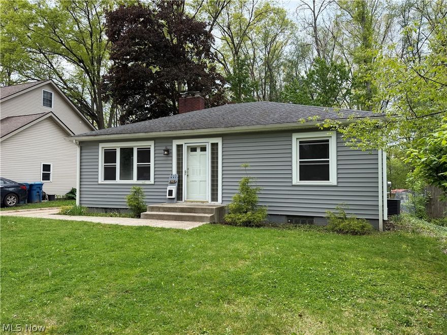A rare opportunity to find a move-in ready home in the heart of Kent, with a .5 acre of wooded privacy. This ranch has everything you are looking for, with updates galore. You are welcomed by gleaming wood floors that flow throughout the main level. The large living room is centered by a gorgeous fireplace and flooded by natural light through the large wall of windows. The dining room flows from the living room to the kitchen, for perfect entertaining. The updated kitchen is stunning- with granite countertops, updated cabinets and newer appliances. The bedrooms have tons of light and good closet space, along with wood flooring and neutral paint color. The full bathroom is completely updated with plank flooring, modern vanity and updated tub surround. The house is filled with charming arches, built-ins and "Kent" characteristics. Your favorite spot in the house will be the enclosed sunroom in the back of the house, with a full view of the peace and serenity of the wooded backyard. In addition to everything already done for you in this home, the full basement is ready to be finished for an additional 1,000 square feet of living. You do not want to miss this home! Call TODAY for your private showing!