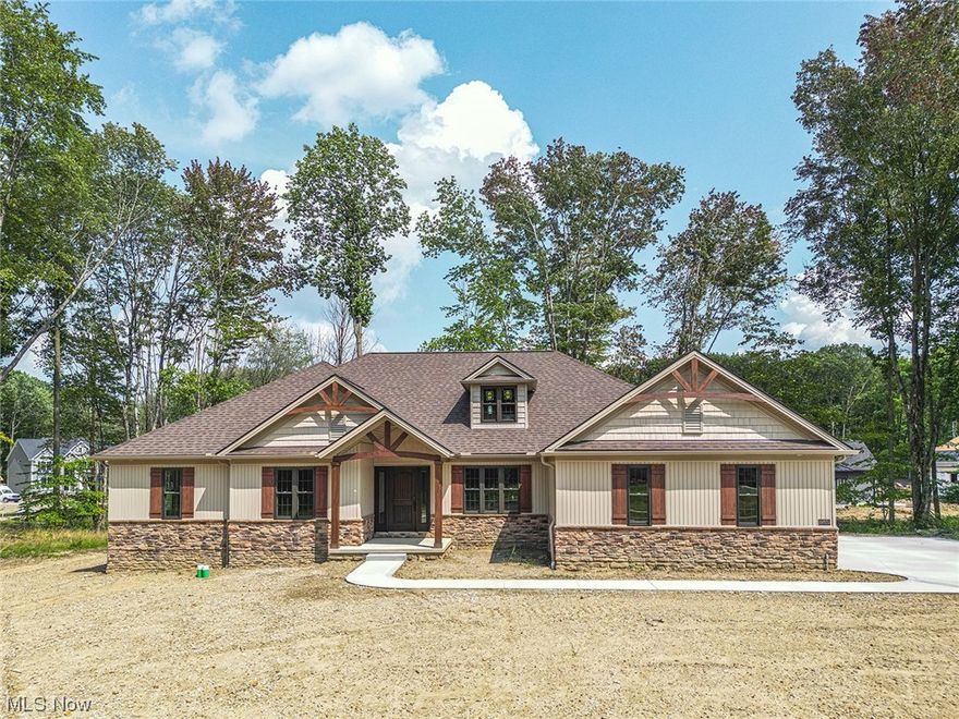 Award Winning Custom Home Builder, Ridgeline Homes Incorporated, with over 42 Years of Building Excellence presents a 3 Bedroom, 2.5 Bath with over 2500 Square Feet! This Captivating Ranch is built with Integrity, Quality and High Standards that are considered upgrades by other builders.  Classic Foyer Entry and throughout Kitchen is enhanced by Exotic Real Hardwood  3/4 inch Flooring and overlooks Trey Ceiling Dining Rm with Crown Molding. 10 ft Ceilings expand the Open Floorplan into the Great Room with Pella Windows that flank the Striking Floor to Ceiling Stone Gas Fireplace, Gourmet Kitchen reveals abundant, richly hued, soft close Custom Built  All Hardwood Cabinetry with Custom Vent/Hood, Quartz/Granite Countertops throughout this home, Island, Walk in Pantry, and Unique Desk Alcove leading to 1/2 Bath & Laundry/Mudroom that has built in seating/storage & LVT floor.  All Colors, Flooring & Cabinetry are top 2023 Designer Choices. Extensive Use of Canned Lighting Throughout this home. Sumptuous Owner's Suite offers 2 Walk in Closets & Ensuite Lux Bath with Deep Soaking Tub, Shower, Dual Sinks, Porcelain and Ceramic.  2 More Bright Spacious Bedrooms and another Quartz/Porcelain Bath.  Walk up Staircase to Attic is already framed for Future Expansion. Massive Basement with Roughed in Half Bath.  Bonus Features are Soundproofed Walls, Whole House Vac System, Security System, 2 Color Pella Windows, Solid Wood Doors, Large, Spacious, Zero Maintenance Trex Deck. 3 Car Garage is Independently Heated,  Vacuum Ported, Hot & Cold Running Water, Dual Openers, Dual Switch, Smart Phone Adaptable. Choices Still Available for Carpeting & Appliances with Full Allowance.  One Year Building Association Warranty, 30 Year Foundation Warranty, Energy Star Compliant.   Please See All Supplements. Home is Built Like No Other. Ground Up Photo Album. Come See this Quality Home Built in the Old World Way!