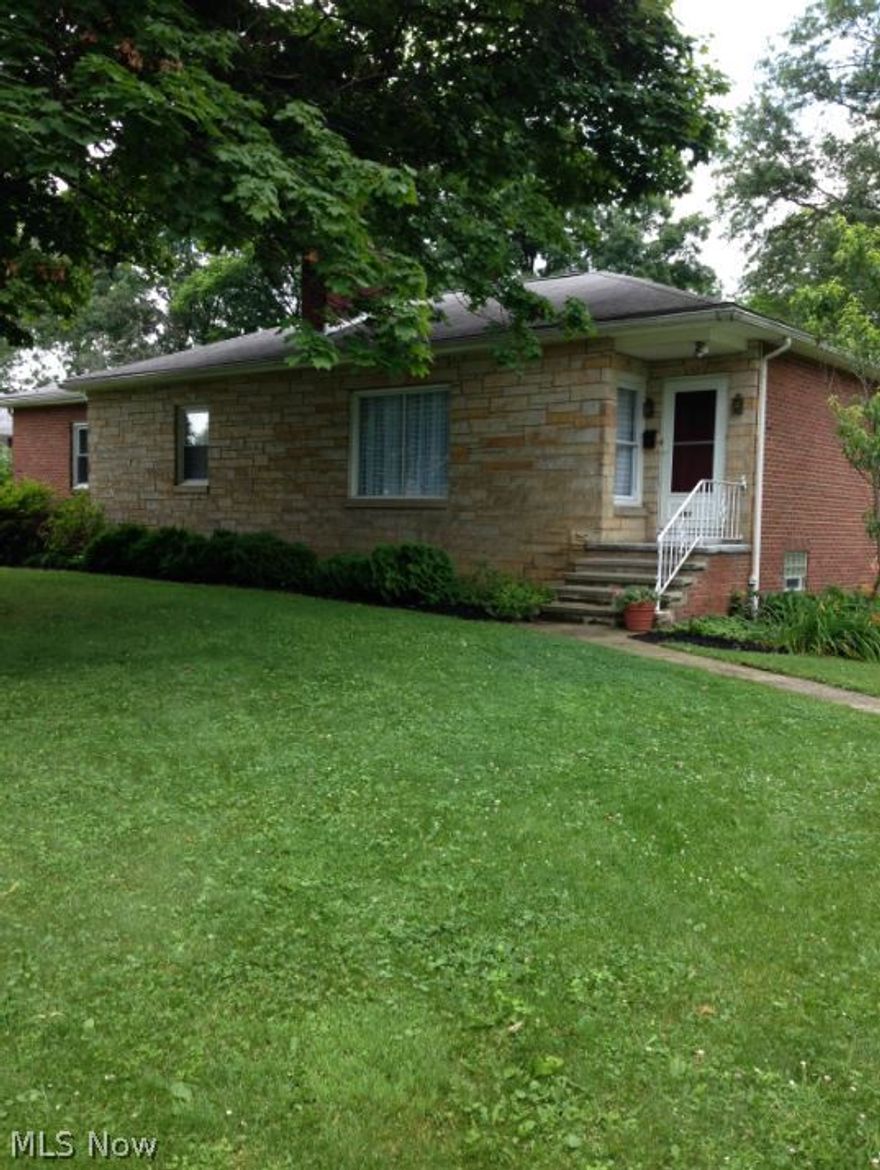 Visit this completely updated West Akron 3 bedroom and 2 bathroom ranch home. Entertaining will be easy in the open eat in kitchen, formal dining room, living room, spacious 27 x 22 first floor family room, large basement recreation room, and backyard patio that is private and secluded. The entire home has new flooring, new lights, and has been freshly painted with neutral colors. For your convenience you will find a new stainless steel kitchen that has all new appliances, cabinets, counter tops, sink, and lighting. For your peace of mind you will find new windows, a new driveway, a new hot water tank, and an all new first floor bathroom. Extras include two fireplaces, a kitchen pantry, great closets, basement bar, plenty of storage, a two car garage and mud room.