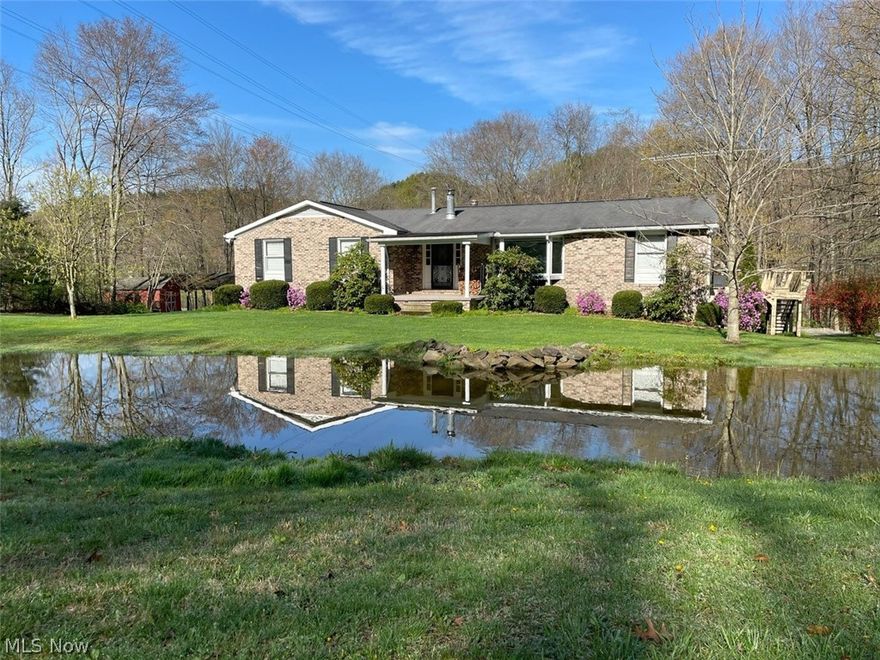 Welcome Family. This great home features a solid brick exterior that is inviting and charming. The home sits on a 4.6-acre country lot. Have the opportunity  to enjoy your own private pond, many trees and wide life to appreciate. Walk in the front door and be greeted with 3 bedrooms, 2 full updated baths and an oversize office being used a 4th bedroom. The master suite offers an oversize built in, multiple closets, and a own suite bathroom.   The open concept kitchen and dining room share a walk out deck, perfect for BBQ and have Sunday brunch. The kitchen also features an oversize walk-in pantry. Enjoy the beautiful warming wood burner in the living room then step downstairs and experience the heated two car garage. A king sized bonus room is waiting for you to finish for your personalized taste. Brand new gas forced air furnace and A/c (Aug 2020). Furthermore, attached is a secondary wood burner for those who enjoy natural heating sources. The home is equipped with a well and septic,