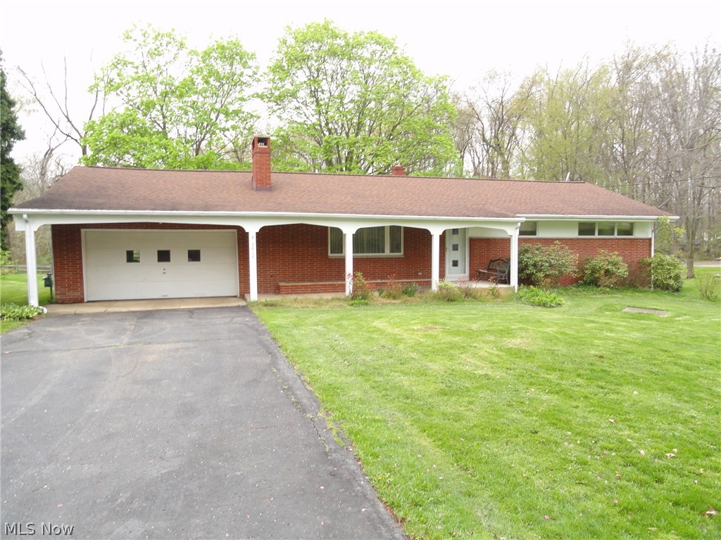 Brick ranch on 1/2 acre in popular and convenient Stow neighborhood. Spacious living room with wood burning fireplace, lovely kitchen with oak cabinets and dining area. Natural wood work and crown molding. 3 bedrooms, 2 full baths plus a huge rec room with 2nd fireplace and 1/2 bath could easily convert to full bath. Oversized deck overlooks 1/2 acre lot. Roof 5 years old. Updated electric and some new windows too!