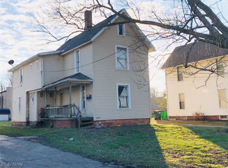 Triplex, currently Zoned Single Family Residential, due to its Vacancy. Interior needs completely remodeled. Can be redone as a Triplex or converted back to a Single Family Home. Ready for your Vision, Investors!