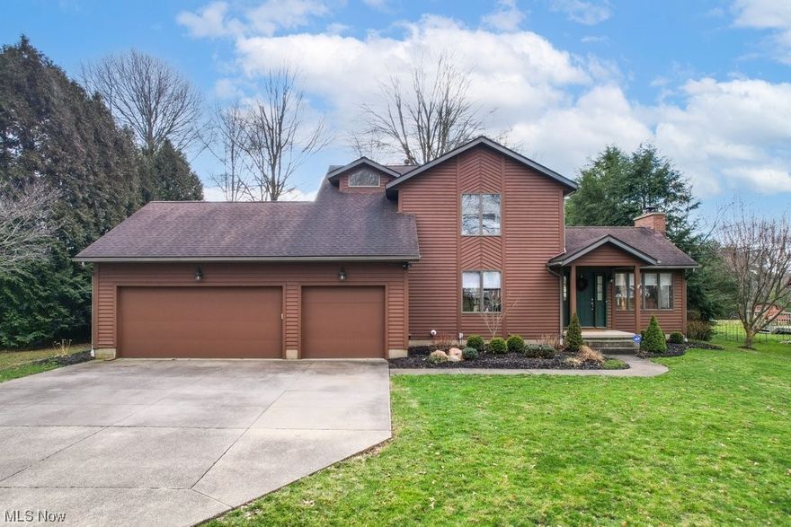 Welcome home! This City of Green 3 bed/2.5 bath, 3 car garage home has been meticulously cared for and maintained by the original owners for 30+ years and is move-in ready for new faces! No HOA; Check out the back yard - fully private, surrounded by mature privacy landscaping to quietly enjoy your covered porch and large deck. On the first floor you’ve got beautiful hardwood floors, tons of natural light, newer appliances, vaulted ceiling living room, and a new gas fireplace with electric starter. Both bathrooms on the second floor have been recently updated and the owners suite features his/hers divided closets. The basement, with direct access to the garage, is fully finished including an optional 4th bedroom or large private office with another auto temp electric start fireplace. Large shed at back of lot w/ electric. Long list of updated mechanicals available with property showing. This one is a must see!!