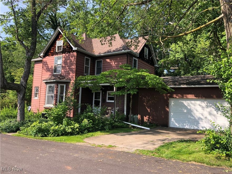 Charming Turn-of-the-Century Home with Modern Comforts and Timeless Character
This 4-bedroom, 2-bath residence blends classic elegance with everyday convenience. Step into a welcoming entry foyer that leads to a formal dining room, cozy den, and a spacious living room, each featuring original decorative fireplaces that add historic charm. The well-equipped, eat-in kitchen is perfect for family meals and offers direct access to the attached double-car garage—ideal for hassle-free grocery unloading. A full, clean basement and a walk-up attic provide ample storage space, while the private backyard offers a peaceful retreat with mature trees and direct access to the bordering city park—perfect for nature lovers and outdoor activities. Nestled on a mostly level large lot at the end of a quiet dead-end street, this home enjoys minimal traffic, offering both privacy and a true neighborhood feel. A rare find that combines vintage character with practical living.