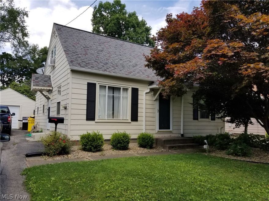 Charming Cape Cod featuring Kitchen / Dining with built-in china cabinet, Formal LR, 2 BD's & new Full Bath on first floor, Master BD is the entire 2nd flloor ( new carpet ).  4th bedroom in basement + additional finished area + full bath.  Enclosed back porch, fenced yard, house & garage recently painted.  New full bath with ceramic tile floor, new sink, new tub/shower.