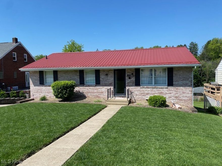 A must see, beautiful 3 bedroom ranch on Brockton Rd Steubenville.   This home features a large living room which flows directly into the dining room.  The kitchen can be accessed through the living room or the dining room.  The exterior of the house is immaculate with beautiful brick, newer metal roof and a very nicely manicured  lawn.   Off street parking is available in the garage that is accessed in the rear of the house.