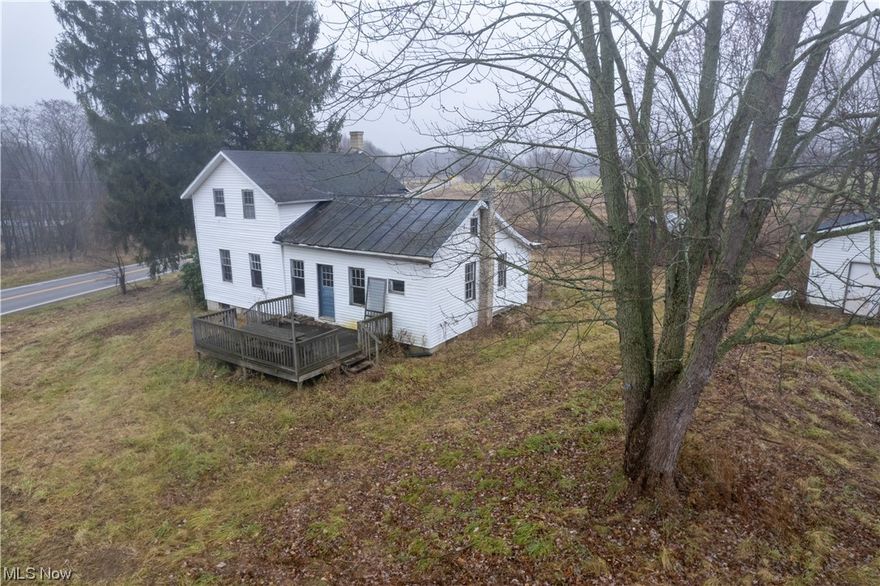 Escape to rural serenity at this former Amish home, a haven of tranquility w/ panoramic views, lush woods, & open fields, offering an idyllic backdrop for your dream home. T2 well maintained barns, steeped in timeless charm, stand ready for livestock or mini-farm ventures, adding character to the landscape. A hidden treasure awaits—a pure, crystal-clear artisan spring graces the property, creating a babbling stream that enhances the serene ambiance. Imagine waking up to the sounds of nature, watching the sunrise over the vast fields, and experiencing the beauty that this property exudes. Whether you envision starting a small farm, embracing a sustainable lifestyle, or simply seeking refuge from city life, this property provides the canvas for your aspirations. Conveniently located near Highway 71 & Rt. 42, enjoy seamless access to transportation, with shopping and dining just a short drive away, seamlessly blending the tranquility of rural living & urban accessibility. With the infrastructure in place, the beauty of the surroundings, & the added natural blessing of an artisan spring, this property is not just a home; it's a canvas for your dreams. Mingle with the past as it meets the present on this enchanting slice of countryside where possibilities are as vast as the fields that stretch before you. Don't miss the opportunity to call this unique property your own—a place where the whispers of nature and the echoes of history converge to create a timeless haven. Welcome home!