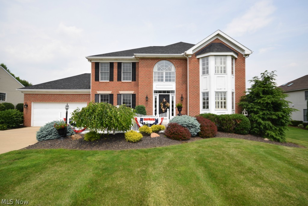 Stately brick front colonial in desirable Hyde Park Estates. Open hardwood foyer. Dramatically-lit gleaming kitchen with breakfast bar which opens to a sunlight-filled dinette. Open and airy great room with gorgeous fireplace. Private first floor office with hardwood flooring. Formal dining room with elegant wainscoting which opens to a light-infused pillared living room. Extensive wide moldings and dramatic inset soffit lighting throughout the main level. Elegantly grand master bedroom features a private master bath with oversized jetted soaking tub, double porcelain sinks, and a generous walk-in closet.
Professionally-finished lower level boasts: a beautifully-inlaid bar (which is also plumbed for a refrigerator), rich oak built-in shelving and cabinetry, along with a gorgeous tiled bath. This spacious living area is perfect for entertaining, movie night, and/or a place to just kick up your feet and relax.
An expansive white-rail deck overlooks a deep and private fenced-in b