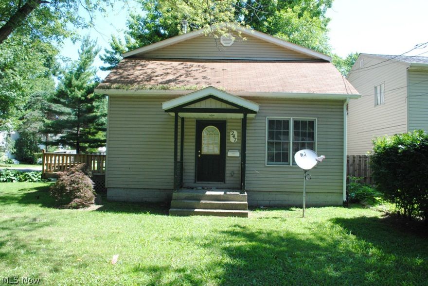 BANK OWNED Vinyl Sided Bungalow ....Corner Lot....  Close To Lake Erie .... Large Living Room .... Eat In Kitchen With Sliders To Large Side Deck .... 3 Bedrooms, 2 Full Baths .... 2 Car Attached Garage ....
