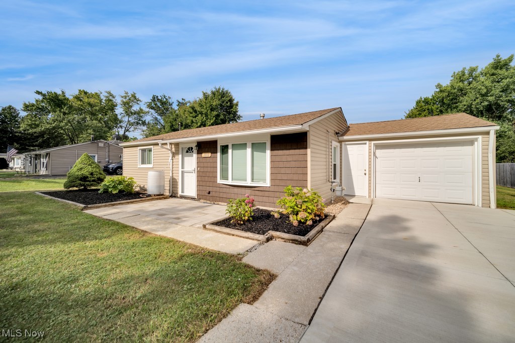 Are you a first time home buyer or looking to downsize to one floor living? Look no further....this one has it all. This cozy ranch is waiting for its new owner. The open concept kitchen boasts beautiful cherry cabinets with marble floors overlooking the .64 acre lot. All of the appliances stay. This home has fresh paint throughout and the carpet was just installed last week!! The extra wide living room has plenty of fresh sunlight beaming through the large bay window that was installed in 2019, oh and its wired for surround sound! The bathroom has the same marble floors as the kitchen with a full tub/shower. The stackable washer and dryer are conveniently located in the cubby behind the shower for easy one floor living. Central air is less than 4 years old. The two bedrooms have large closets and vinyl windows. The garage is conveniently located off of the kitchen to protect us from the cold winter days with a brand new driveway. There is also a door in the garage leading back to the Gorgeous oversized lot!! Bring your grill, swing and a good book because nothing says relax as much as this home. Call to make your appointment today!!