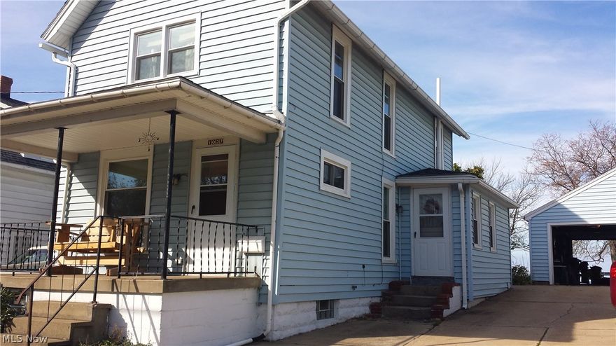 A great home priced right with a Lake view. If you're looking for that property that gives you a great opportunity for boat storage and a drive-through garage look no further. This very comfortable three bedroom one bath home located with close proximity to Lake Erie is just what you're looking for.