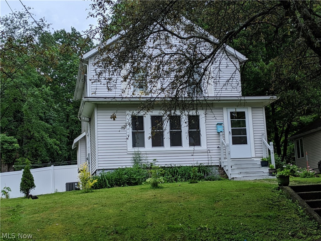 Completely remodeled Kent single Family Home in close proximity to downtown, Kent State University, Farmers Market, Shopping, Eateries of Kent, Night life of downtown set on a beautiful cherry blossom lined street w/ large City lot! 4 bedroom & 2 full bathrooms, newer HVAC. 2nd floor w/ 3 bedrooms & full bathroom w/ tub/shower, 1st floor bedroom or rec room or play room & full bath on 1st floor w/ shower! Oversized 1 car garage w/ attached covered grilling & eating pavilion, huge back yard w/ raised flower beds, gardening & fruit trees abound all surrounded by fence! Large shed holds outdoor lawn care equipment & yard accessories! Interior of home has newly added sliding glass door from kitchen to access patio & pavilion, great for entertaining or just relaxing! Kitchen w/ hard surface white marble look countertops, gorgeous floor coverings & double coat closet. Chefs kitchen opens into large Dining Room w/ original window seat & natural sunlight to show off all remodeled flooring: wo