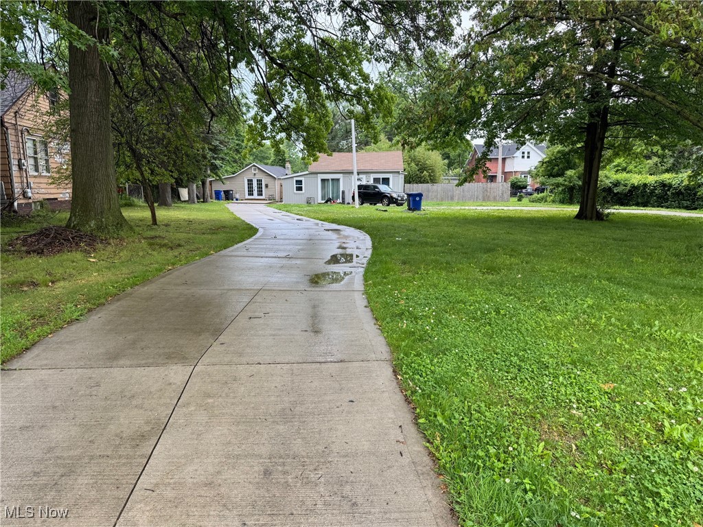 Super unique MF and possible future development. 18024 Marcella Rd in Cleveland's North Collinwood neighborhood features two single family cottages on a .5 acre lot. Both units are rented out bringing in a total of $2225/per month. Professional local property management in place, and ready to assist you with a seamless transition. An additional .88 acre parcel behind the property (113-11-086) is included. Awesome opportunity for someone with long term vision. Contact your favorite agent today! AGENTS READ REMARKS.