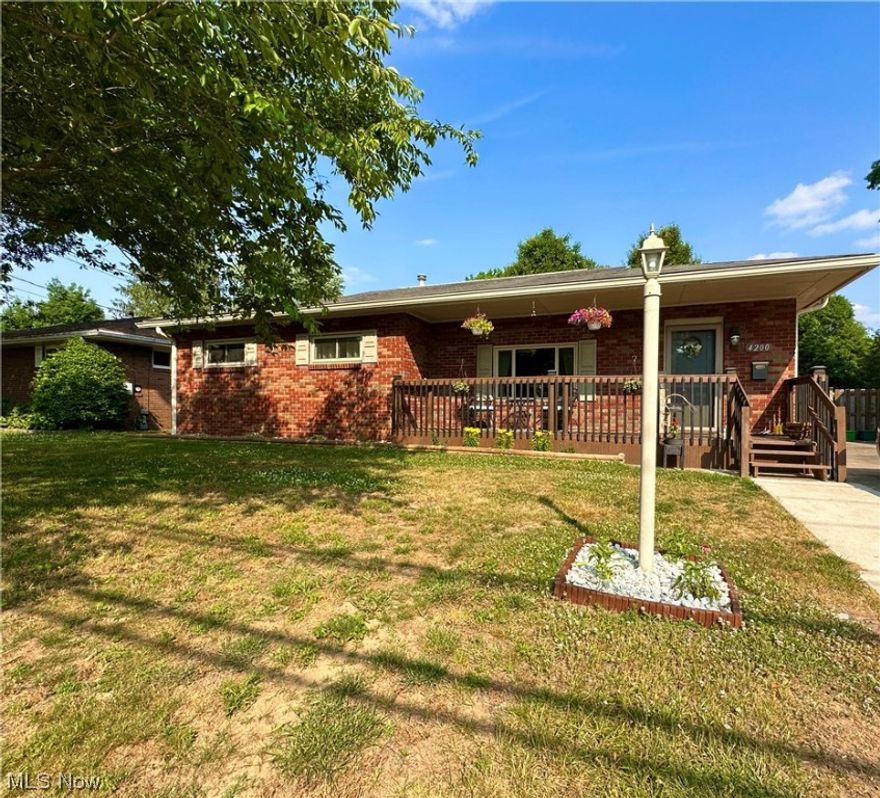 Beautiful Brick RANCH on a quiet Vienna Street. This well cared for home offering 3 BDs/2 BAs will delight from the curb and beyond. A welcoming front porch has been added to enjoy peaceful evenings and has plenty of space for seating. The foyer has a generous closet and leads directly to the sinfully spacious eat-in kitchen. You will fall in love with the cheery cabinet color, stainless appliances, farm-style sink, solid wood countertops, and quaint breakfast bar area. Hardwood runs through the rest of the home and the living area provides an open concept layout. The dining room has large windows that share nearly floor to ceiling views of the wonderful, screened patio and level backyard. Head down to the basement and you will be amazed at all the storage it has to offer, and it already has a finished bonus room that would be the perfect family room, gym, home office, or fourth bedroom! This basement if filled with tons of potential; completely finish it and add more square footage. T