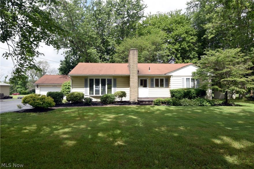 This cozy ranch home offers more space than meets the eye. With two fully finished floors and many updates, this home can do it all. Enter into the private foyer and living room with original hardwood floors. An inset fireplace is accented by a mirrored glass mantle. The first floor full bath is nearby, offering a large double vanity, tub shower combination. Bedrooms can be found adjacent to the bath, each offering large windows and closet space. The larger, master bedroom offers dual windows along with an oversized closet. Each room freshly painted and new laminate wood flooring installed. Beautifully updated eat-in kitchen with multiple cabinets into the updated kitchen multiple wood cabinets. The stacked ovens provide a welcome touch for the at home chief. Downstairs you’ll find an entire additional kitchen and full galley area; excellent for roommates, or allowing personal living space for a child or relative. The space doesn’t stop as carpeted flooring leads you to an additional f