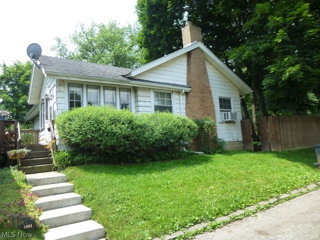 Almost 1/4 acre of usable land within walking distance to the University. Completely fenced for privacy on a quiet court off of one the prettiest streets in Steubenville. Addorable 2 bedroom, very well maintained and move in ready. Kitchen boast a cozy nook for early morning coffee and the LR has a beautiful wood insert for those chilly evenings. Gorgeous sunroom in front lets tons of light in throughout the day. Newer roof, furnace, carpet and flooring throughout. Brand new hot water tank.
