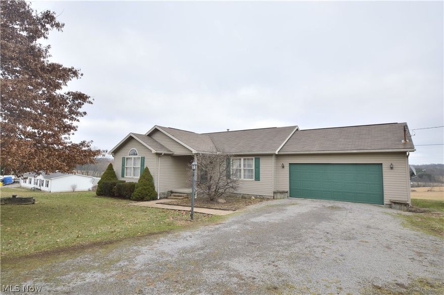 Perfectly located ranch style home offering the peace and quiet of country living but with quick and easy access to town. Enjoy your space on this beautiful property and in this equally beautiful home.  As you walk through the front door, you will enter your spacious living room with a large picture window and coat closet . Just off the living room the huge open kitchen offers tons of counter space and has  enough room for an eat in kitchen! As you're cooking in your lovely kitchen, soak in the country views through your kitchen window and sliding glass door that leads you to the large rear deck perfect for grilling and dining outside. You won't have to worry about space in this home as it offers three large bedrooms, one being the master with it's own private master bathroom. The partially finished basement makes the perfect play space or man cave. Call today to view this home that offers the best of country living with convenience to your favorite shopping and entertaining!