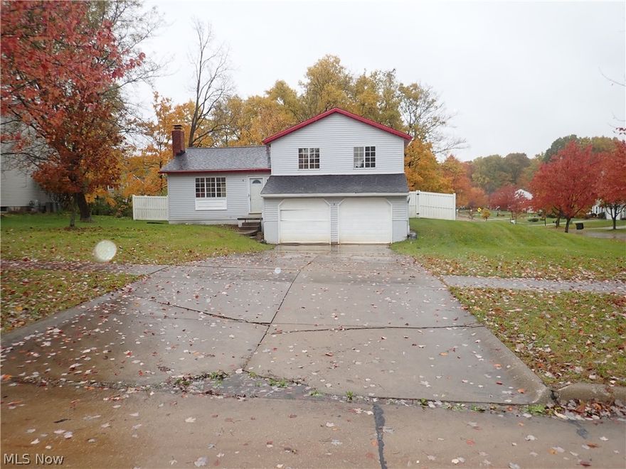 Fantastic location with a large corner lot in the Sturbridge development. 3br 1.5bath split level boasts lots of potential and tons of space. Large yard 0.37 acres with a 6ft white vinyl privacy fence! High Efficiency Furnace. Open floor plan in living room / dining / kitchen. Newer Kitchen! Bonus room in lower level could be used as bedroom. Fireplace. 2 car attached garage. Remodel started... just a little left to complete! Bring your sweat equity!