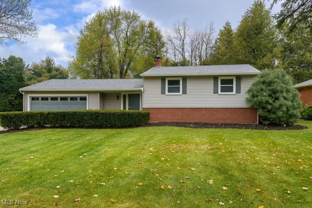 Beautifully updated home tucked away with a woodsy, private backdrop! Located in the township and just a short walk to Riverview Elementary, this property enjoys a 200-ft wooded easement and 75 acres of open field behind it for a secluded feel. Inside, nearly everything has been updated in the last few years: the kitchen features white shaker cabinetry, granite countertops, subway tile backsplash, and stainless-steel appliances (all approx. 2 years old). Both bathrooms are refreshed with modern vanities, fixtures, and finishes. Hardwood floors run through much of the main level, while the lower level is finished with new flooring and offers versatile living space — perfect for a rec room, guest suite, or home office. Roof approx. 10 years old. Move-in ready with neutral colors and thoughtful updates throughout. Come see this beauty before its gone.