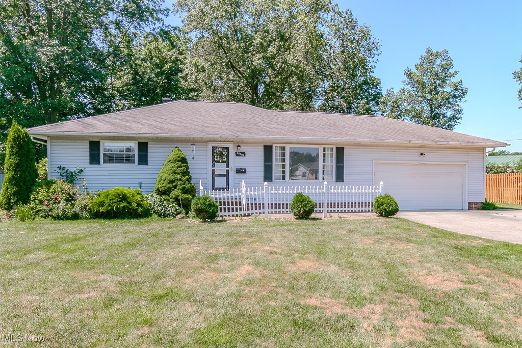 Situated on a quiet cul-de-sac, this ranch-style home sits on a generous 0.52-acre lot and offers both comfort and functionality. This home welcomes you with a spacious living room with a flexible dining space near the front entry and features 3 bedrooms with hardwood floors and a full bath conveniently located between them. Enjoy the eat-in kitchen with direct access to the 3-season room, perfect for morning coffee, relaxing evenings overlooking the backyard with a door to a deck for grilling and access to backyard. A hallway off the kitchen leads to a half bath, garage entry, and basement stairs. The lower level includes a finished rec room, a laundry and utility area, a workshop space, and a separate shower room. Backyard backs up to Manry Park and other backyards. This home offers great potential for someone that wants to make it their own or as an investment property. Being sold as is.
