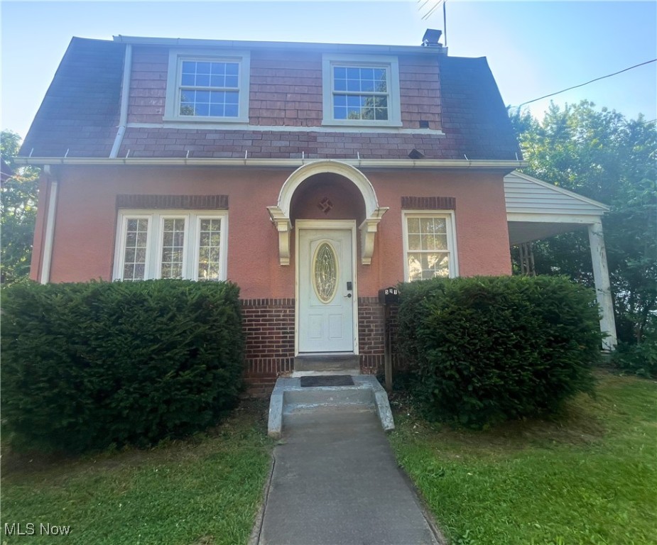 Step into timeless charm with this delightfully colonial in the heart of Goodyear Heights! This 2-bed, 1-bath home showcases original woodwork, hardwood floors, and a classic fireplace. Sun-filled rooms with recent updates which include a a remodeled bathroom, newer furnace, hot water tank, & plumbing offering worry-free living. Enjoy cozy evenings on the covered side porch and quiet gatherings in the private, fenced backyard with shed. Plenty of storage space awaits in the unfinished basement. Located just minutes from Reservoir Parks pool, courts, playground, and community center, this home blends historic character with today's comforts. Don't miss your chance to own a piece of Akron's heritage!