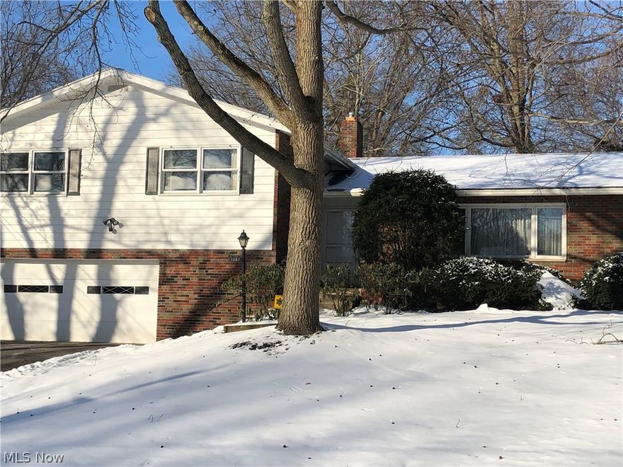 One Owner!  Spacious split-level with great bones in super-convenient West Akron location near Fairlawn Country Club.  Main level has large Living Room open to Dining Room, Eat-in Kitchen with pantry, and screened-in porch with glass doors overlooking private yard.  Garage level has entry, powder room, and Family Room with bar and fireplace.  Upper level has four (4) spacious bedrooms including Master with en-suite bath and walk-in closet, and three other bedrooms share hall bath with double sinks.  Great storage.  Oversized 2 car garage with extra 8 x 20 space for storage.  Unfinished Lower Level with Laundry and Workroom.  Call today!