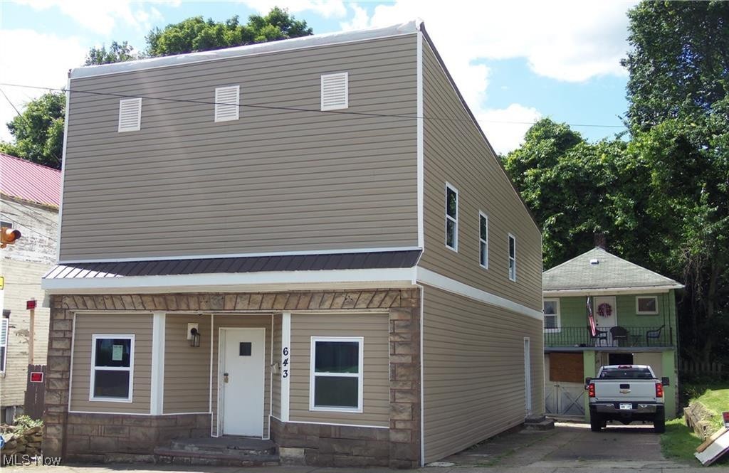 Investment Opportunity - Three Unit Property in Downtown Follansbee! Prime location! This 3-unit property in the heart of Follansbee is a great investment opportunity that you don't want to miss. Conveniently located near shopping, dining and other amenities, this property has a lot to offer. Two of the three units are occupied, generating a total gross income of $1,450/month. The 3-bedroom unit is vacant and ready for you to finish the renovation with your own personal touch! Maximize your income potential with the strong rental demand in such a desirable location. Whether you're looking to expand your portfolio or start your real estate investment journey, this property has great potential!