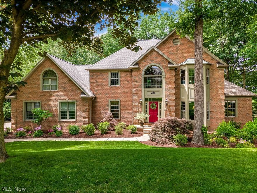 This mint condition all brick and well-loved Memmer built home is remarkable. There is so much detail and quality you have to see it. Over 5000 square feet of living space with old-world charm. The kitchen is a chef's dream with tons of storage, workspace, and high-end appliances. Off the kitchen is a 3 season screened porch that overlooks a park-like backyard with expansive decks and decorative ponds. The walk-out lower level adds great entertaining space and a sauna... this place is incredible!