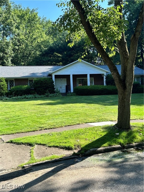 This home was custom built in 1967 and is a one owner home. The ranch home sits on a quiet street. The Kitchen was remodeled with custom cabinets, solid cherry with upper lighting. The laundry is on the main floor for easy access, was and dryer remain. New carpet in 2025 is in the living room, dining room, and hallway. The basement is partially finished with a bar and pool table. The unfinished side is a dream for a person that likes to tinker with built-in storage and work benches. This is a must see!