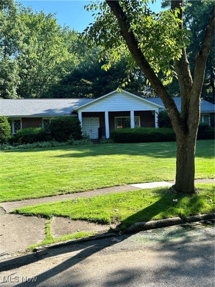 This home was custom built in 1967 and is a one owner home. The ranch home sits on a quiet street. The Kitchen was remodeled with custom cabinets, solid cherry with upper lighting. The laundry is on the main floor for easy access, was and dryer remain. New carpet in 2025 is in the living room, dining room, and hallway. The basement is partially finished with a bar and pool table. The unfinished side is a dream for a person that likes to tinker with built-in storage and work benches. This is a must see!