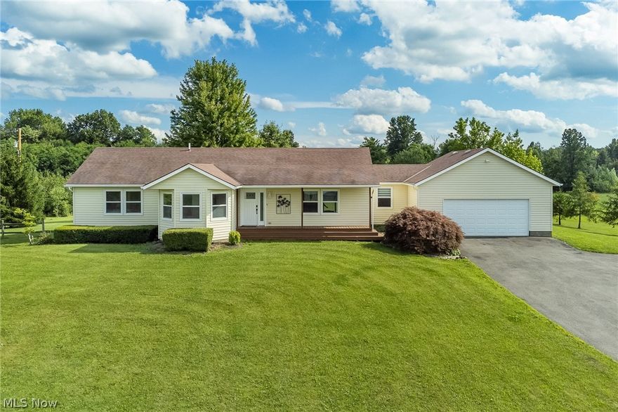 5 acres of beautiful country living! This home has a recently updated kitchen with gorgeous marble countertops and new flooring throughout! Open living area with an abundance of natural light. Spacious master bedroom with a bathroom and access to the deck. Full walkout 13 course basement. Large back deck perfect for enjoying sunsets or entertaining. Out building provides plenty of storage.