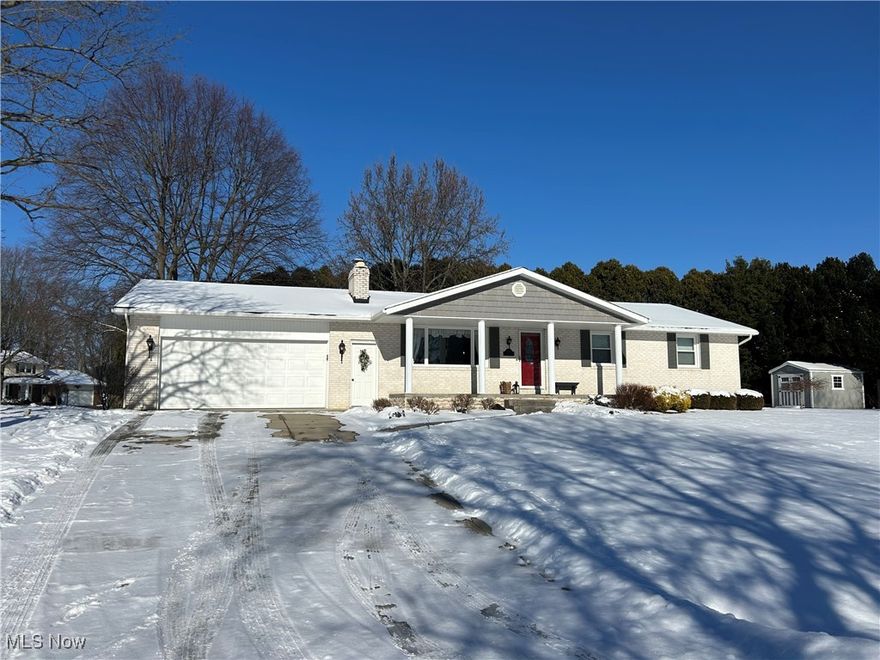 Beautiful brick ranch in Jackson Twp. in pristine condition. The corner lot provides plenty of privacy and is located in an established neighborhood. The newer concrete drive with stamped concrete walkway and covered front porch adds to the lovely curb appeal. There is also a rear covered porch and patio area with fire pit for outdoor enjoyment. Many interior upgrades: large open kitchen with granite counter, stainless steel appliances, new tile backsplash, breakfast bar and plenty of cabinet space plus desk. There is a new sliding door leading to the rear covered porch. The main bedroom has its own newly updated private bath with walk in shower and plenty of closet space. The main bath has newer tile and vanity. The lower level boosts plenty of space to entertain. A cozy stone fireplace is featured in the family room with track lighting. Another kitchen is nearby with plenty of cabinets and a refrigerator for convenience. Plus, there is a large bonus room for 4th bedroom, or media room or home office. Plenty of additional living space! There is a separate laundry and storage room with a roughed in, plumbed full bath ready to be finished. The attached oversized 2 car garage offers additional storage. Must see this lovely home!