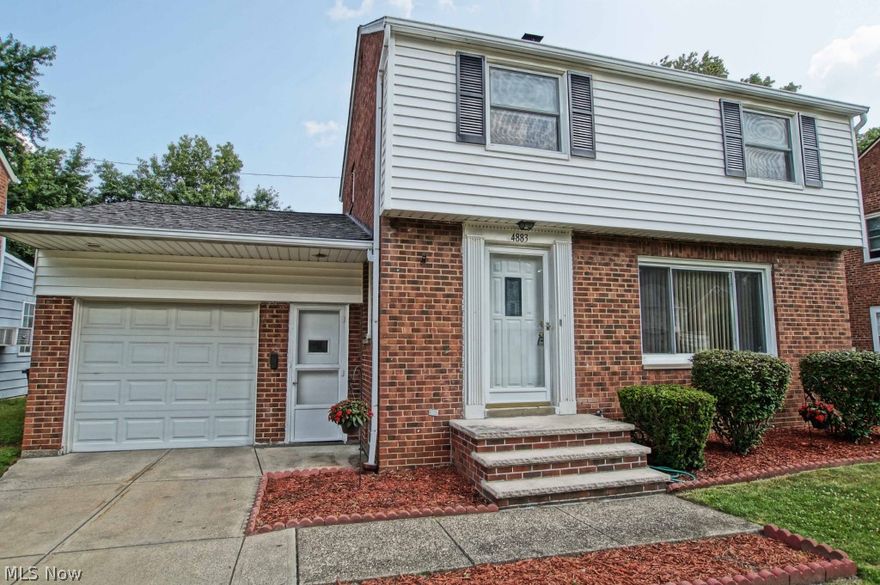 Beautifully Maintained and Updated home.  All rooms have hardwood flooring under carpet.  Newer windows, roof, door and garage door.  Kitchen remodeled with Tile flooring, new countertops and cabinetry.  575 sq ft. of finished basement with built in seating and storage area.  1/2 bath in basement off utility/laundry room.  Garage is deep for additional storage area with walk out door to back patio area.  Sun room has wrap around windows complete with blinds and overlooks scenic wooded back yard.  All appliances stay and 1 Year Home Warranty is included.  Move in ready - Relax and Enjoy your home!!