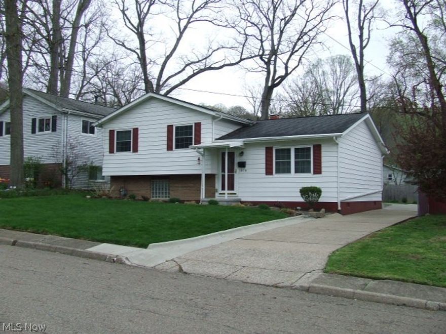 Come take a look at this 3 bedroom split in the Metro Park area of Merriman Valley!  Living room has newer carpet and is open to eating area. The all oak kitchen has appliances that stay.  Two bedrooms upstairs share a full bath and the master bedroom has a half bath and double closets.  The lower level family room area is finished, with laundry area, half bath and has a poured concrete foundation.  There is also unfinished crawl space for storage.  The laundry room has walk out to breezeway and garage.  Washer and dryer stay.  The backyard enclosed with a privacy fence.  Updates include newer steel doors, glass block windows and tankless water heater. New kitchen flooring scheduled to be replaced in May. Home Warranty included.  This was originally a model home and has been well maintained, the added availability of the nearby parks and recreation is a plus!  Don't miss this one!