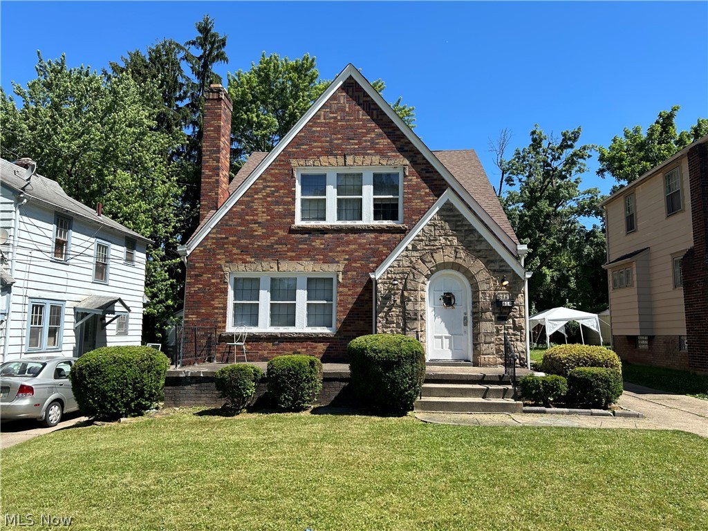 Tudor style duplex. Upstairs unit has 2 beds/1 bath. Downstairs unit has 2 beds/1 bath. 3 fireplaces throughout the home.