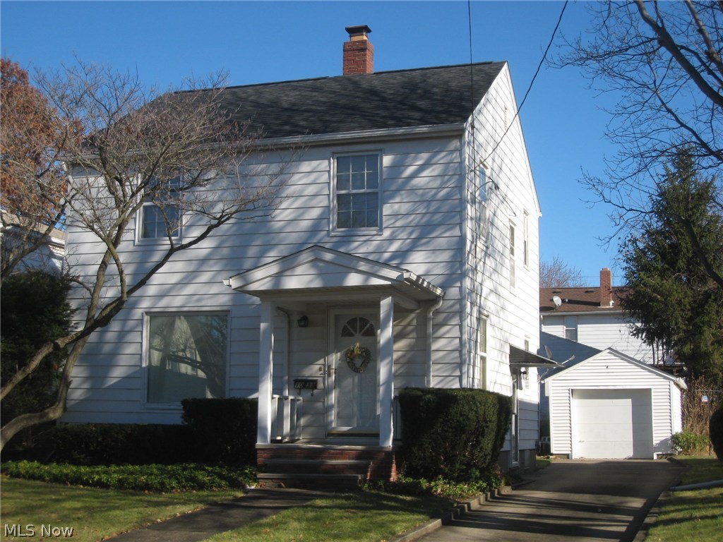 What a Find! As you pull up, you will notice the manicured landscaping, which reflects the meticulous care this home has received through the years. Spacious living and dining room with clean, light plush carpet. a FIRST floor bedroom with a full bath and laundry! The fully applianced kitchen completes the main floor. Upstairs you'll find 3 bedrooms with hardwood floors and another full bath. The interior is freshly painted with neutral colors. Garage with opener and concrete patio, private yard. Roof installed in 2016. Call for your appointment now!