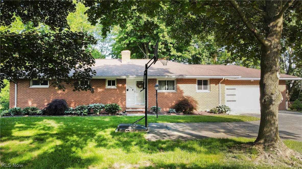 Come on home to this 3 bedroom, 2 bathroom ranch with a 2 car attached garage, located in one of the most coveted pockets of Painesville Twp! Fastidiously cared for with a careful eye to detail and thoughtful updates throughout, you will love being on a street with deep lots and established, mature trees that envelope the whole neighborhood. This home boasts major upgrades that YOU don't have to worry about including new windows (2017), AC (2021), huge deck (2021) and full bathroom renovations(2017). This single floor living option gives you generous living and entertaining space on the first floor--an oversized living room, and an open concept kitchen and dining, perfect for the chef of the house who likes to stay connected with their company while they cook. Great sized primary bedroom with ample closets and private ensuite bathroom. The other 2 bedrooms share a renovated hall bathroom. Hardwood floors in all three bedrooms! Before you head downstairs, check out your new favorite per