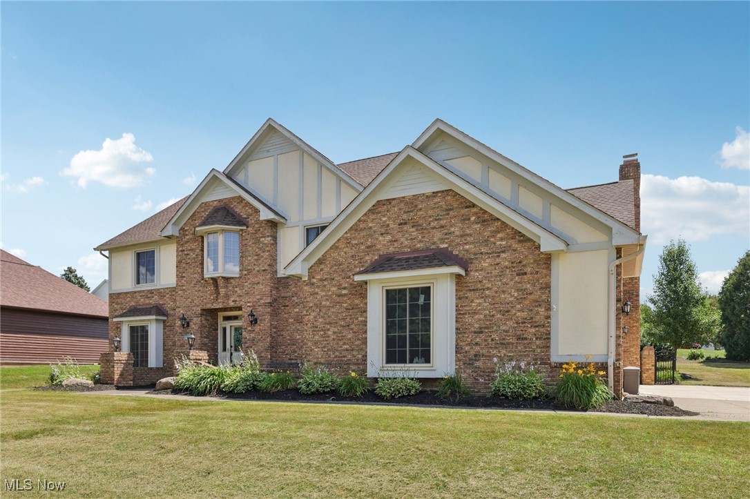 Welcome to 1101 Partridge Dr in Wadsworth, OH! This stunning home features 4 bedrooms, 3 bathrooms, and nearly 3,000 square feet of living space on a corner lot, accentuating its beautiful brick exterior. Upon entering, you're greeted by a welcoming foyer with a grand staircase and heated coat closets, perfect for chilly days. The interior is bright and inviting, with wood flooring installed in 2022 and fresh paint. Updated light fixtures from 2023 to 2024 add a modern touch to the first floor. A versatile home office, which can double as a fifth bedroom, is conveniently located on the right as you enter. The spacious kitchen boasts granite countertops, while the living room offers vaulted ceilings, a cozy fireplace, and a wet bar. Upstairs, you'll find four bedrooms, including an expansive owner’s suite with a walk-in closet, jacuzzi tub, and updated shower. The clean, finish-ready basement offers nearly 1,500 additional square feet. Outside, a charming back patio complements the home’s timeless crown molding and hardwood doors. Recent improvements include a new roof in 2019, new HVAC in 2022, concrete porch and expanded driveway poured in 2023, New front windows installed in 2024 that come with a 10-year warranty. Need more? This property is just minutes away from everything you need in Wadsworth. You’ll find Buehler's Fresh Foods, ALDI, Walmart, Applebee's Grill + Bar, the beloved local favorite The Galaxy Restaurant, Starbucks, and much more, all within a short drive! If you’re in search of the perfect home, look no further! Contact our office today to arrange a showing or to submit your offer!